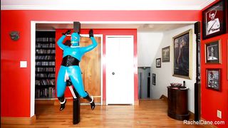 Living Spandex Statue in tortured in Restrain Bondage