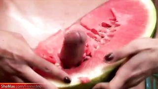 T-lady masturbates and tears up her massive shecock in a watermelon
