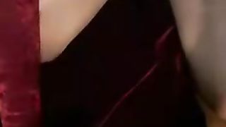 Crossdresser in velvet have fun on sofa