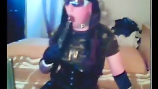 Ditzy Sissy is attempting to deep-throat on web cam