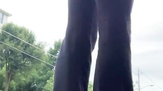 Trampy crossdresser cock-squeezing yoga trousers public street
