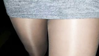 Ambling on the street in pantyhose