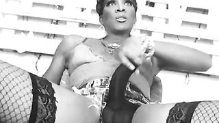 Intensity Top Trans plays with her BIG BLACK COCK thru erection thong