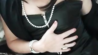 Candice in dark-hued vinyle