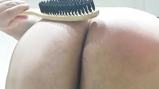 Davina slapped 24 milks of the hairbrush on each cheek