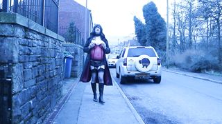 crossdresser outdoors on a residential street