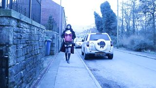 crossdresser outdoors on a residential street