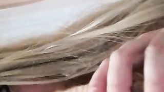 Crossdresser Niki inhaling faux-cock