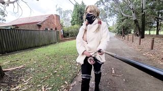 Exhibitionist slut displaying in a wool coat by a engaged road