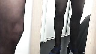 Sissy spunks in front of mirror