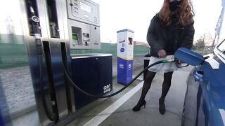 Getting gas crossdressed in white miniskirt