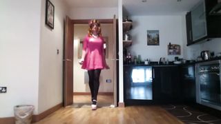 Sissy Rachel Mincing In Rosy Skater Sundress