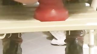 Christina doing the humungous crimson cork