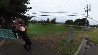 Crossdresser demonstrating on a highway bridge