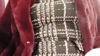 Crossdresser smoking in high stilettos