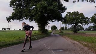 She-Male Outdoors Splashing Milk, Peeing and Fapping