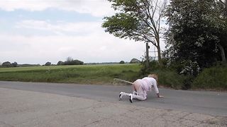 She-Male Outdoors Splashing Milk, Peeing and Fapping