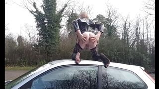 Crossdresser Peeing on Van Roof