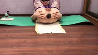 Sissy Lisa in fishnets opens up her brown sphincter