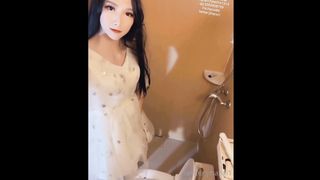 Nice t-girl on a pretty sundress urinating on the restroom milking and jizm nut-juice