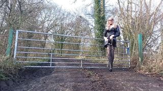 UK Whore in vinyl Posing Outdoors