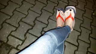 a night roam sans undies in taut denim and spin-flops