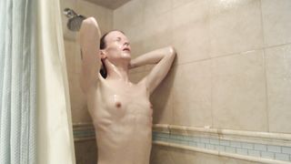 Sumptuous delightful Tgirl JadeIsRad showers & trims her schlong sleek
