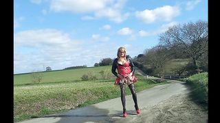 Crossdresser Gina in vinyl Peeing Jizzing Splattering Outdoors