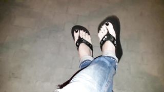 a crossdresser on a night walk ambles around and entices with his luxurious soles