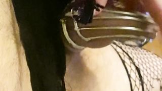 Domme torments her encaged spunk-pump