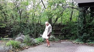 Jerking On A Windy Day - in wool, pleated satin gown and nylon stocking