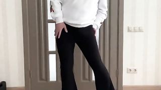 Sissy in flared shoe cut black pants and white hoodie with roses jerking and dancing for your delight