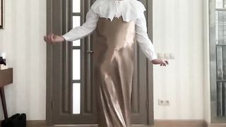 Gold satin long maxi sundress and white ruffled college office assistant half-shirt on trap sissy crossdresser dancing and jizm