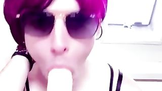 Lusty sissy takes good-sized faux-cock in her jaws