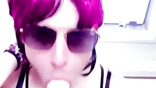 Lusty sissy takes good-sized faux-cock in her jaws