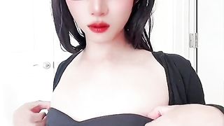 Japanese CD Eva in Cock-Squeezing Black Microskirt and Stocking