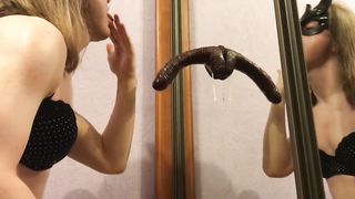 Sissy Elise idolizes manhood in front of the mirror up close