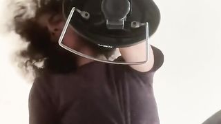 Long haired femboy sits on their rod