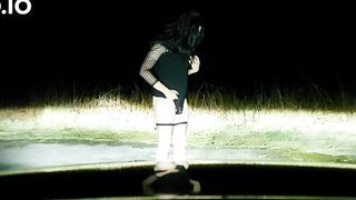 Sissy stripping outdoors