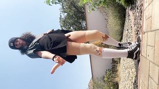 Femboy jizzes in wide daylight and plays with fake penis