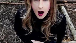 Sissy Alexandra is waiting for dudes in the woods while dressed in hip high shoes