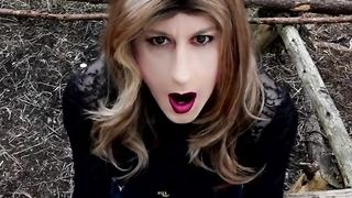 Sissy Alexandra is waiting for dudes in the woods while dressed in hip high shoes