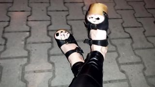 crossdresser in high heel plunges and stretch pants