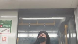 Night walk at instruct station and parking plenty of with fishnet stockings