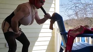 DeeDeeSlut69 in a Yellow Sundress on her balcony Toying