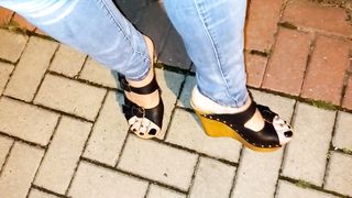 crossdresser demonstrates off her jaw-dropping soles in high heel sticks in public