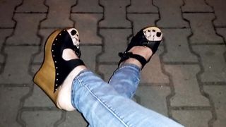 crossdresser demonstrates off her jaw-dropping soles in high heel sticks in public