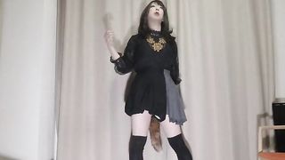 Asian crossdresser jacking conveniently with s tail in the backdoor.