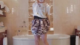 Chinese crossdresser with rabbit ear jizm in a luxury motel shower. cumdrop.