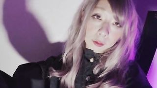 Asian crossdresser jizz flow in a colourful apartment.